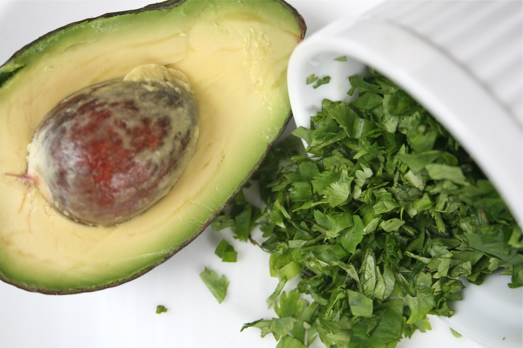 Avocado and a fresh herb blend for topping off roasted vegetables