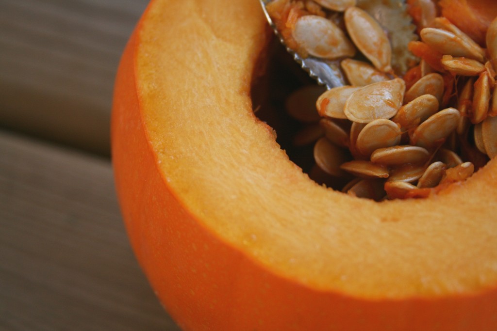 removing pumpkin seeds is easier with a serrated spoon